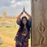 Roopal Tyagi Instagram - Hampi reminds us that everything is temporary. A once lavish, rich and vibrant culture, today stands still in time.. leaving behind ruins …albeit stunning! This place has a different vibe. You gotta visit to know ✨ #hampidiaries #indiatravelgram #karnataka #hampi #unescoworldheritage #vijayanagaraempire Hampi, Karnataka
