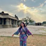 Roopal Tyagi Instagram - Hampi reminds us that everything is temporary. A once lavish, rich and vibrant culture, today stands still in time.. leaving behind ruins …albeit stunning! This place has a different vibe. You gotta visit to know ✨ #hampidiaries #indiatravelgram #karnataka #hampi #unescoworldheritage #vijayanagaraempire Hampi, Karnataka