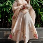 Sagarika Ghatge Instagram - | AHILYA | Beige chanderi anarkali and dupatta featuring our signature hand painted pink floral motifs paired with a cotton churidar. @akuteebysagarika Shop the look on www.akutee.co.in (link in bio) Photographer: @sprinkledwords . . . . . #AkuteeBySagarika #WomenOfAkutee #AkuteeClassics #Festive #Ethnic #Traditional #Anarkali #HandPainted #Elegant #IndianWear #TimelessClassics #SagarikaGhatge #AnarkaliSet #ChanderiSilk #OccasionWear #Style #MadeInIndia #ChanderiSuits #ChanderiAnarkali #KurtaSet