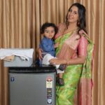Sanjjanaa Instagram - It was such a proud and special moment for me to be shooting for @voltasbeko washing with my family … machine by #tata brand , thank you to all the people who have sent me applause on all my platforms as this ad has gone live everywhere featuring me my husband dr.azeez pasha & my baby @princealarik - thank you for all the love. You have showered on us. @sanjjanaagalrani Beautiful saree @iyra_designstudio Hair @hair_artist_ramyagowda Make up @divyamakeupartistofficial Karnataka, Bangalore