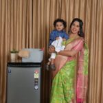 Sanjjanaa Instagram - It was such a proud and special moment for me to be shooting for @voltasbeko washing with my family … machine by #tata brand , thank you to all the people who have sent me applause on all my platforms as this ad has gone live everywhere featuring me my husband dr.azeez pasha & my baby @princealarik - thank you for all the love. You have showered on us. @sanjjanaagalrani Beautiful saree @iyra_designstudio Hair @hair_artist_ramyagowda Make up @divyamakeupartistofficial Karnataka, Bangalore