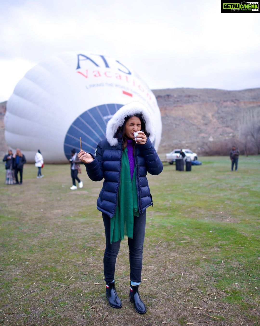 Sharanya Turadi Instagram - My โBut coffee first pleaseโ moment right before I took my first ever hot air balloon over the beautiful terrains of Cappadoccia โ ๐ Thank you, @gtholidays.in, for checking one off my bucket list ๐ Comment if Hot air balloon is on your bucket list too ๐โโ๏ธ #dreamsdocometrue โจ๏ธ #travel #turkey #cappadocia #bucketlist #littlethingsinlife #makememories Cappadocia/Turkey