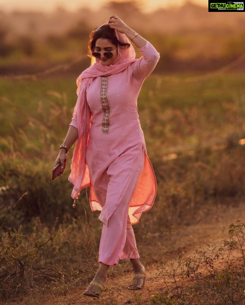 Sharanya Turadi Instagram - Some beautiful paths can’t be discovered without getting lost ,they say, ain’t that the truth? 🫶✨ Man behind the lens @rahul__sudharshan , caught a slice of my day so raw and beautifully! Walking through our little piece of farmland by the sunset . We had to attend a wedding in a village later that day so I had to pick a salwar suit little festive yet subtle and that was when this peach suit I picked from @tada_wearhouse came to my rescue! To more sunsets and beautiful memories ❤️