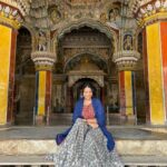Sharanya Turadi Instagram - Frames of Thanjavur ❤️ 1. The colourful darbar of King Sarabhoji 2. The super cute elephant, ‘Mangalam’ from Kumbeshwarar temple, kumbakonam 3. The artistic view of Tanjavur palace 4. The famous filter coffee of Mangalambikai mess 5. My lifeline gang 6. The brass statue of Shiva and Parvathy from Chola period 7. The relaxing view of Tanjavuru mannu just before summer rains 8. This beautiful dome standing alone I found at Adikumbeshwarar temple with intricate colours painted inside 9. Me trying hard not to laugh while my whole gang is standing at the other side of the camera 😝 #kumbakonam #thanjavur #templesofsouthindia #mangalambikamess #thanjavurpalace #summerrains #historyisbeautiful Thanjur