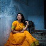 Sharanya Turadi Instagram - Old world charms 💛 I could only think of this song when I entered Kanchi kudil, a hundred year old heritage house at Kanchipuram. A heavy oonjal, Burmese teak pillars, mutham behind the house, tottil room. Samyal kattu with utensils we have never seen before, and so many to mention ❤️🤌 Seeing those old houses realising they would be demolished for new construction projects in the near future often terrifies me. I wish we could retain more old houses like this 🥺 I bet you’d end up emptying your camera storage clicking pictures once you get there! Wearing Sungudi saree summer dress @ivalinmabia In these days of fast fashion, It is hard to find clothes worth wearing it again and again. This is one of my favourite sustainable piece of possession 5 years old and it still hasn’t lost its charm just like this house 😍✨ Will post more pics of the house on my next post kanmanies! #tamilnadutourism #enchantingtamilnadu #ttdc #tntourism #styling KanchiKudil