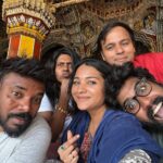 Sharanya Turadi Instagram - Frames of Thanjavur ❤️ 1. The colourful darbar of King Sarabhoji 2. The super cute elephant, ‘Mangalam’ from Kumbeshwarar temple, kumbakonam 3. The artistic view of Tanjavur palace 4. The famous filter coffee of Mangalambikai mess 5. My lifeline gang 6. The brass statue of Shiva and Parvathy from Chola period 7. The relaxing view of Tanjavuru mannu just before summer rains 8. This beautiful dome standing alone I found at Adikumbeshwarar temple with intricate colours painted inside 9. Me trying hard not to laugh while my whole gang is standing at the other side of the camera 😝 #kumbakonam #thanjavur #templesofsouthindia #mangalambikamess #thanjavurpalace #summerrains #historyisbeautiful Thanjur