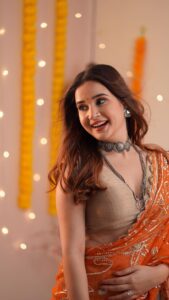 Shivshakti Sachdev Instagram - Navrang Mere Sang ✨

Worshipping Goddesss Navdurga wearing Orange color on Sunday bestows the person with qualities such as warmth and exuberance. This color is full of positive energy and keeps the person upbeat 🧡

Outfit - @anjanase_official 

#navratri #navratrispecial  #navratrijewellery #navratrifever #navratrivibes  #navratrilooks #garba #navratrinights  #navratridays  #NavrangMereSang #navratrioutfitideas  #navratrifashion #happynavratri2023 #mumbainavratri #navlinavratri #garbafever #navratriideas #navratricolors #9days9colors #fashionblogger #festivevibes #reelsofinstagram #trendingreels

Navratri Outfit Ideas | Navratri Fashion | Navratri Videos | Navratri Festival | Durga Pooja | Orange Traditional Outfit | Navratri First Day