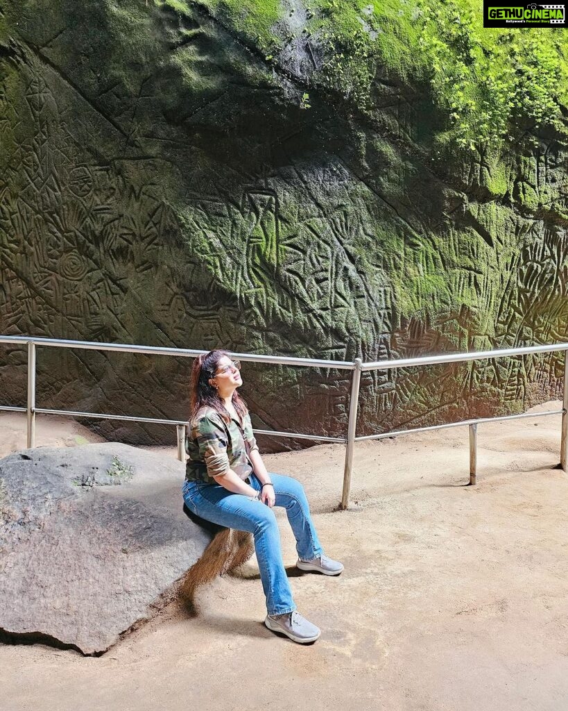Sneha Wagh Instagram - The climb was difficult but the view was worth it…The Edakkal caves, in Kerala are said to be around from 6000 BCE. There were scriptures which are said to be written by Neolithic Man, having a strong connection to the Indus Valley Civilisation! These Stone Age Era Carvings are the rarest of the rare. In a few pictures we can see figurines that of men, women and animals pictorials depicting that of the tribal nature who worshipped the Sun! The best part which surprised me was, even though it’s situated in our Indian province, it was discovered by a british officer! . . . #incredibleindia #indiatourism #india #wanderlust #ssnehawagh #sarangesneha #snehawagh #kerala #keralatourism #edakkalcaves #trek #cavestory