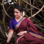 Surabhi Lakshmi Instagram - സാരികൾ കഥപറയുംപോലെ 💜🧿❤️ Photography @limelightcapture Wardrobe. @silk_mandir Hair & makeup. @makeover_by_sanaah Ornaments. @golden_cup_fashion_jewellery blouse design @celebrate_clothes_n_crafts ❤️ @mangala_raghu #saree Valayanad Devi Temple