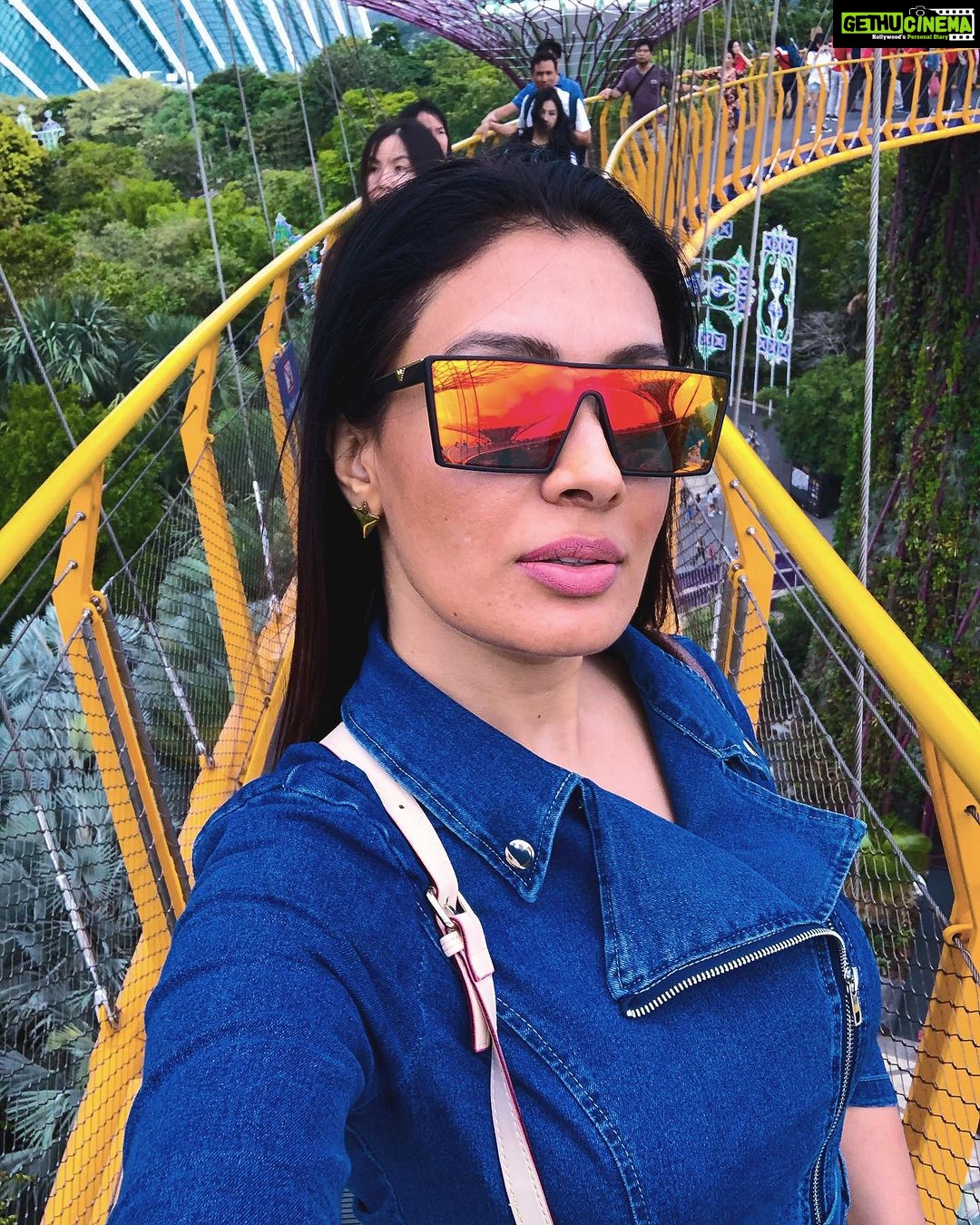 Surabhi Prabhu Instagram - "Seeing Singapore through my favorite orange-tinted glasses! Memories are always brighter with a little cheekiness. 🍊🕶️ Exploring the botanical wonders of Gardens by the Bay in Singapore. 🌼 ✨ . . . . #surabhiprabhu #mumbaiblogger #strongwoman #fringes #mumbai #hindiquotes #india #redlips #tollywoodactress #californiaadventure #californialove #californiagirl #californialiving #flatirondistrict #bollywoodhot #voompla #pinkvilla #bollywoodcinema #हिंदी #bollywoodmovies #supermodel #modeldiaries #thekapilsharmashow #travelgram #travelphotography #travelblogger #bollywoodactoractress #bollywoodactress #surabhi Gardens by the Bay Singapore