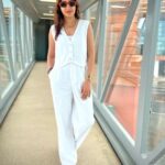 Surbhi Chandna Instagram - Location Courtesy - Aerobridge White on White Airport Look - @srstore09 Shades @prada Gifted by @pranavi_chandna 🤎