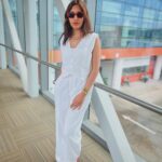 Surbhi Chandna Instagram - Location Courtesy - Aerobridge White on White Airport Look - @srstore09 Shades @prada Gifted by @pranavi_chandna 🤎