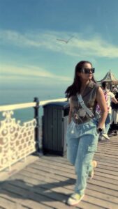 Surveen Chawla Instagram - So brightly…in Brighton 💙 #2023 #SummerTravelDiaries #ByTheBeach #BeachBum #BlueSkies #Blessed #Reels #ReelItFeelIt