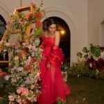 Tanvi Ram Instagram - Bold, beautiful, and unapologetically red🍷 Concept & styling @storiesbysiyahhhh Makeup @_sanaah._ Outfit @label_natalia_livingston Photography @jibinartist Videography @teen_wid_alpha_ Production house @tinyturtle.media Decor @decorlabevents Jewls @golden_cup_fashion_jewellery #RedDressSlay #red #autumn #flowers #instadaily #instagram #instagood