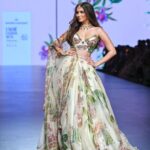 Tara Sutaria Instagram - Tara Sutaria, our muse, embodying the essence of our Autumn/Winter ‘23 collection, ‘𝚏𝚒𝚍𝚊’. She looked ethereal, as she graced the ramp in an iconic ivory floral hand embroidered lehenga, at our showcase at Lakmé Fashion Week, in partnership with FDCI. @mahima9 @lakmefashionwk @fdciofficial Videography: @deveshkap00r Makeup: @themakeupmaven__ Hair: @zoequiny.hair Stylist: @shauryaathley with @aprajitapuri #MahimaMahajan #TaraSutaria #Fida#LakméFashionWeekxFDCI #LakméFashionWeek #LFWxFDCI #LFW #fdci#bollywood