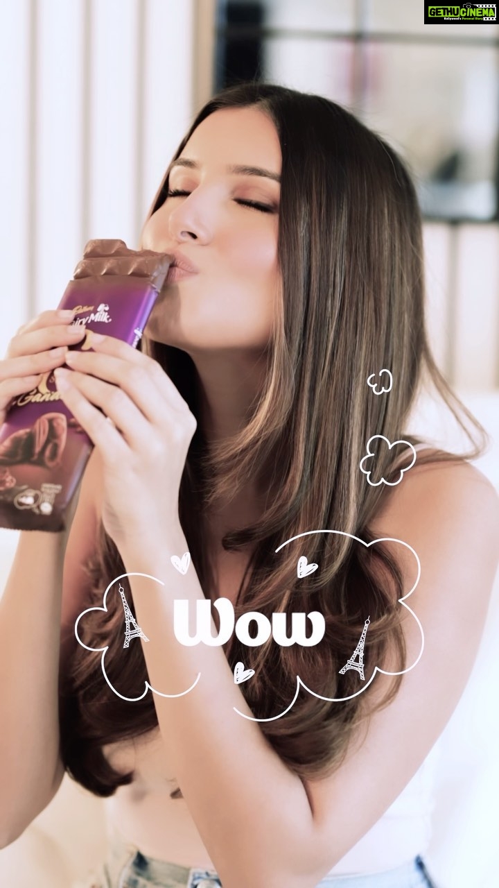 Tara Sutaria Instagram - The new Silk that #FeelsLikeAFrenchKiss is here and I’ve just reviewed it! Sort of 🤭 Try the new Cadbury Silk Ganache for yourself💕Click on the link in @CadburyDairyMilkSilk bio and use the code TARA20. #SilkGanache #FeelsLikeAFrenchKiss