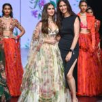 Tara Sutaria Instagram - Tara Sutaria, our muse, embodying the essence of our Autumn/Winter ‘23 collection, ‘𝚏𝚒𝚍𝚊’. She looked ethereal, as she graced the ramp in an iconic ivory floral hand embroidered lehenga, at our showcase at Lakmé Fashion Week, in partnership with FDCI. @mahima9 @lakmefashionwk @fdciofficial Videography: @deveshkap00r Makeup: @themakeupmaven__ Hair: @zoequiny.hair Stylist: @shauryaathley with @aprajitapuri #MahimaMahajan #TaraSutaria #Fida#LakméFashionWeekxFDCI #LakméFashionWeek #LFWxFDCI #LFW #fdci#bollywood