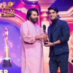Tovino Thomas Instagram – Life is crazy!
Had the incredible moment of receiving an award, blessings and words of wisdom from Mammukka. It was truly overwhelming being there and listening to the idol say pleasant things about me – a buildup in his own style, something I’ll proudly carry forward in life. Thank you Anand Film Awards for the Best Actor Award for 2021. Thanking everyone involved, who made this dreamy day for me. ❤️👋
മമ്മുക്കയുടെ കയ്യിന്നാണ് അവാർഡും അനുഗ്രഹവും കിട്ടിയേക്കുന്നെ , ഇനി എന്നെ പിടിച്ചാ കിട്ടൂല്ല 😁

#ialmostcried #milliondollarmoment # Manchester, United Kingdom
