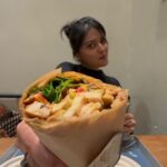 Vaibhavi Shandilya Instagram - Embracing the delicious chaos: Diving into this juicy chicken wrap with all my clumsiness and foodie passion! 🍗🌯🤤 #messyeater #foodieadventures #foodielife #clumsyfoodie #messyeater Mumbai, Maharashtra