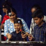 A. R. Rahman Instagram – We have been wanting to introduce further sections of the orchestra for a while now. And the time has come. We are starting with the percussions and the woodwinds sections in the Orchestra. 

With the help of @teachforindia , we have been able to identify some enthusiastic and absolutely deserving children from some of the corporation schools in Chennai to kick start these classes. The art and educational director of @kmmcchennai , @adamjgreig introduced the students and their parents to the sunshine orchestra and the various sections it has. @rahulvanamali , the faculty for percussions introduced these students to the various instruments they will be learning soon. 

Our brass director @lisa._.sarasini and a few of her amazing students shared their experience throughout their time at the sunshine orchestra and helped the parents and new students understand the orchestra better. 

On behalf of the management, students & faculties at the Sunshine orchestra, a warm welcome to the Sunshine family!

#thesunshineorchestra #percussions #woodwinds KM Music Conservatory