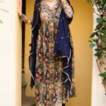 Aditi Vats Instagram - “Anarkali Enchanté Azure Grove” Outfit Description: “Anarkali Enchanté Azure Grove” is a masterpiece ensemble from “The Mystic Mirage Collection “. Adorned with intricate detailing, the vibrant forest blueprint fabric elegantly wraps around a neckline and bust line, showcasing meticulous craftsmanship. Paired with chic santoon pants, the ensemble is elevated by a pure chiffon dupatta, adorned with exquisite work that graces the entirety of its flowing expanse, creating a harmonious blend of sophistication and style. Order Placement: For pricing and order placement , please reach us via DM or email at support@jvyal.com #jvyal #jvyal #ethnic #ethnicwear #beautifuloutfit #dresstokill #beauty #outfitstocravefor #brand #thingstowear #loveindianwear #indianwear #indianwearlove❤️🇮🇳