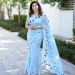 Aima Rosmy Sebastian Instagram - AAMBAL 💙 Embrace the ethereal beauty of the AAMBAL saree, a captivating collaboration between grace and nature's enchantment. Saree @tazzels3 Clicks by @vineethphotos Muweillah Comercial, Sharjah UAE