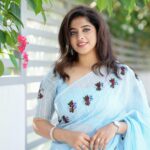 Aima Rosmy Sebastian Instagram - AAMBAL Draped in the enchanting allure of a Water Lily, this exquisite saree, skillfully crafted by @tazzels3 💙 Clicks by @vineethphotos 📸 Muweillah Comercial, Sharjah UAE