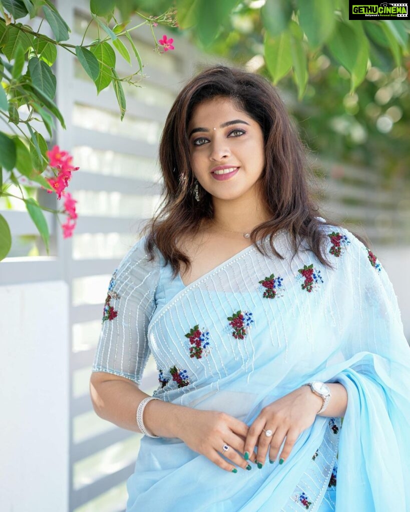 Aima Rosmy Sebastian Instagram - AAMBAL Draped in the enchanting allure of a Water Lily, this exquisite saree, skillfully crafted by @tazzels3 💙 Clicks by @vineethphotos 📸 Muweillah Comercial, Sharjah UAE