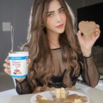 Angela Krislinzki Instagram - Guilty, not at all guilty... 🍩Hooked on to Chocolate Peanut Butter from @myfitness . Peanut butter is a Great source of unsaturated fat. Especially for fitness, it’s very important to have peanut butter which doesn’t have hydrogenated oil. For all the fitness lovers, this is what you should be using for your fat intake. Tastes delicious and that’s why I use it aswell! Highly recommended. Get yours on Amazon, it is available in three variants- Chocolate,Crunchy and Smooth. Kudos to my friend @sahilkhan for this new venture. Thanks for being a great teacher, life coach and a great friend. Keep Shining 💫