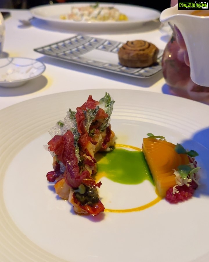 Angela Krislinzki Instagram - Ristorante L' Olivo at Al Mahara Restaurant at Burj Al Arab is an exquisite dining experience by Chef Andrea Migliaccio from Capri's Two-Michelin star 'Ristorante L'Olivo' Delicious cocktails and incredible food with charming service The aquarium is filled with over 20 species of fish they are so mesmerizing! Share this with who you would like to dine at this underwater restaurant. #burjalarab #michelinstar #jumeirah #dubai #seafood #italian #michelinguide #restaurants #luxuryhotel Al Mahara Restaurant - Burj Al Arab (Dubai)