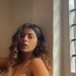 Anisha Victor Instagram - I love looking out of the window… I could do it for hours.. and it may seem like a colossal waste of time to many but it brings me peace. A short meaningful pause in the chaos of the city( same AQI but still helps). I’m running at hundred miles per hour… okay not literally 100 miles/hour but you get the picture. The path is uneven, might even hit my toe against a rock sticking out of the ground, the coconut just about hanging on to its last fibre misses you by a second or maybe not, a gust of wind brings with it some sand ready to make my eye a temporary habitat (and if it has to be… let it be my left eye God! I use the right one to shoot). The little insect aims straight for the eyes or the nose or the mouth and that’s my first meal of the day. The little pebble… a teeny tiny microscopic pebble in my shoe! Do not underestimate it. You know the feeling right! It’s not exactly an itch you can’t scratch…you can take off your shoe and ….well just scratch your foot and take the invincible pebble out but wouldn’t it be nice to go just one day without that happening. The crow pooped on my shirt but I’m still running because at least it didn’t get my hair this time, no reason for me to stop now when some detergent and water can take care of it later. And of course you’re going to encounter a curve ball… and I’m not taking metaphorically here;an actual curve ball. Well, what was I expecting…I’m on a track in a Cricket field. But I keep running. I see my smartwatch and I stop to quench my thirst. Luckily I have a bottle of sweet sweet water on me. Now back to running again…and if you still think it’s about running… The water bottle is the window. 🪟 Fin. Bandra West