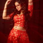 Anjana Rangan Instagram - Day 3 : Red ♥️💥 The colour of Power, strength and Courage. She is Fierce when she loves. When she fights. When she wins! She is Red ❤️‍🔥 #navarathricollections by @magicbyjeeni Shot by @padambyveni MUAH : @kalai_hair_and_makeup ✨