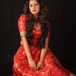 Anjana Rangan Instagram - Day 3 : Red ♥️💥 The colour of Power, strength and Courage. She is Fierce when she loves. When she fights. When she wins! She is Red ❤️‍🔥 #navarathricollections by @magicbyjeeni Shot by @padambyveni MUAH : @kalai_hair_and_makeup ✨
