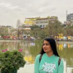 Archita Sahu Instagram - Many of you asked what I was wearing in last few posts . That’s ‘Ao dai’ . It’s the Vietnamese dress basically a silk tunic with straight pants . I got to know about it while talking to few locals who helped me with the shop address too to buy from. And here I am with few newly made local friends ❤️ NB : last pic shows my touristy mode 😂 #aodai #hoankiem #cafe #SabyArchita #archita #travel #road #rickshaw #bus #cafehoankiem #highlandcoffee