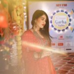 Denisha Ghumra Instagram - One of my favourite looks from Navratri 2023❤️ . Captured - @kaledioscopik @shutterhalf Jewellery - @thejewelstudiio Outfit - @dreamsbydenisha MUAH - 💁🏻‍♀️ All my cholis stitched by - @n_r_desiner . #navartari2023 #redandpink #navratricollection #myfm #navlinavratri #denishaghumra