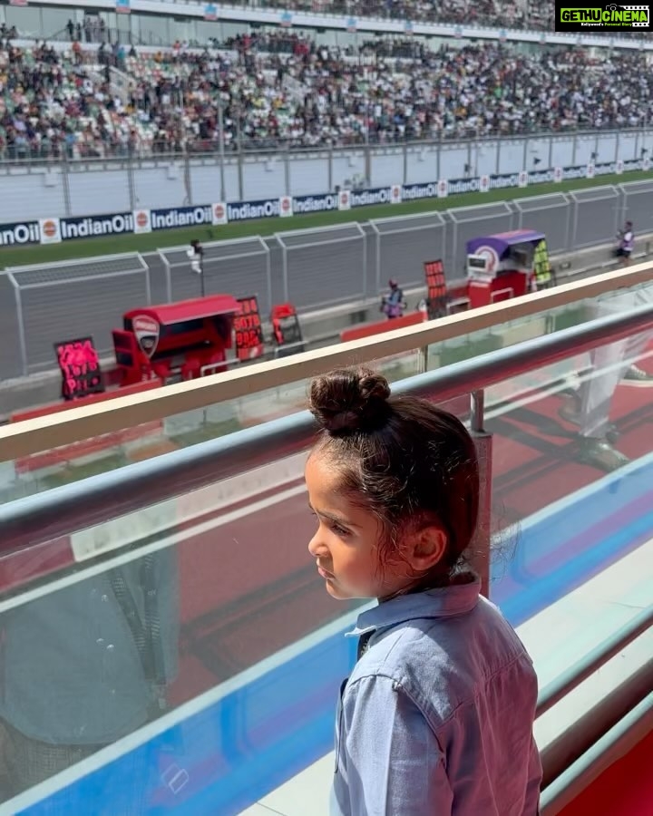 Gul Panag Instagram - Seeing the race through Nihal’s eyes was fun. He’s been a regular at the @buddh.international.circuit for a few years, now courtesy , his Mom’s jury duty on @ackodrive and before that on @carandbike and of course his uncle Sid @sidpatankar . But this was his first time at an actual race. I wasn’t sure if he’d last . 😅 I thought he may get bored, and the crowd can be quite overwhelming . And then there was the noise. Music to some of us, but it is still pretty high decibel sound. ( As the Husband captured on his @apple watch- last video ) He took to it like fish to water. Stood in the balcony, watching two complete races ( Moto GP and Moto 2) as sweat, dripped from his face and drenched his shirt . It WAS pretty humid. And sunny. Yes, I think he is a motorsport fan in the making .🥰 And he was quite cognisant of Marco Bezzecchi’s considerable lead from early in in the race. And kept asking if No 72 was going to win!! @motogpbharat @buddh.international.circuit @motogp #motorsport #motogp #motogpbharat Buddh International Circuit