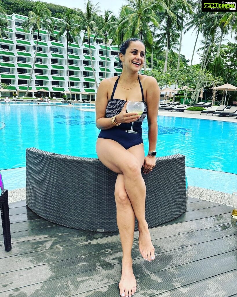 Gul Panag Instagram - Pool and beach vibes only.🤩 This trip, I rested the beginning to become fragile black and white @marksandspencer swimsuit. But I want want to take this opportunity to introduce you to two new ones- ( since I had so many queries on my stories). I believe a swimsuit should be comfortable, practical, durable and very flattering. 😅 So here’s a bit about these. Photo 1 is another trusted @marksandspencerindia suit. Durable. I have had it for about 5 years now. The neck strap is beginning to lose a bit of elasticity, but is adjustable so easy fix. Photo 2 is the new @ripcurl full sleeves suit I got recently. I end up spending a lot of time in the pool with Nihal. And often my shoulders and arms get badly burnt no matter how much sunscreen I apply. And this seems like a really good alternative. Not sure how durable it will be. It’s made a very fine, thin material almost like a pair of stockings. Photo 3 features a pink one , Roxy, that is also fairly new. (Got it last year here in Phuket. At the airport. There’s a great store that sells Quicksilver, Roxy and billabong in the arrival hall by the baggage belts.) It has Excellent stretch. And is very comfortable. The wrap is a really comfortable @Zara shirt I got some years ago. Photo 4 has the same swimsuit from photo 1 , but with a very nice wrap I picked up here, at the hotel on this trip. Nice flattering wraps are hard to come by / and this one is a particularly good one. For those of you who read through all of this, let me know if there are more queries you have, and I will answer them in the comments. Thanks for reading .❤️ Phuket, Thailand