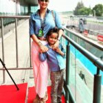 Gul Panag Instagram - Seeing the race through Nihal’s eyes was fun. He’s been a regular at the @buddh.international.circuit for a few years, now courtesy , his Mom’s jury duty on @ackodrive and before that on @carandbike and of course his uncle Sid @sidpatankar . But this was his first time at an actual race. I wasn’t sure if he’d last . 😅 I thought he may get bored, and the crowd can be quite overwhelming . And then there was the noise. Music to some of us, but it is still pretty high decibel sound. ( As the Husband captured on his @apple watch- last video ) He took to it like fish to water. Stood in the balcony, watching two complete races ( Moto GP and Moto 2) as sweat, dripped from his face and drenched his shirt . It WAS pretty humid. And sunny. Yes, I think he is a motorsport fan in the making .🥰 And he was quite cognisant of Marco Bezzecchi’s considerable lead from early in in the race. And kept asking if No 72 was going to win!! @motogpbharat @buddh.international.circuit @motogp #motorsport #motogp #motogpbharat Buddh International Circuit
