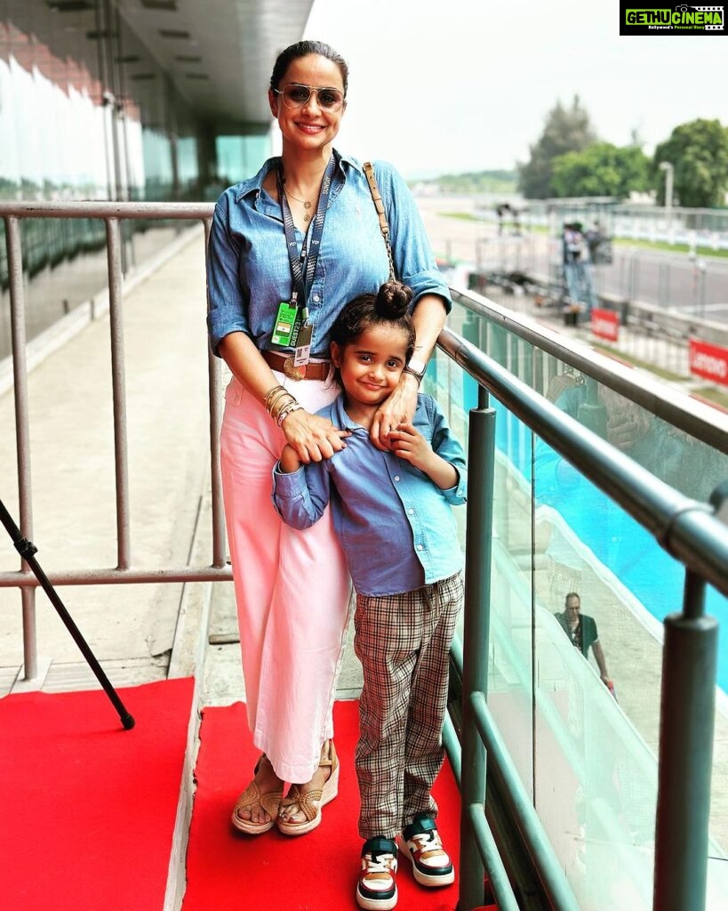 Gul Panag Instagram - Seeing the race through Nihal’s eyes was fun. He’s been a regular at the @buddh.international.circuit for a few years, now courtesy , his Mom’s jury duty on @ackodrive and before that on @carandbike and of course his uncle Sid @sidpatankar . But this was his first time at an actual race. I wasn’t sure if he’d last . 😅 I thought he may get bored, and the crowd can be quite overwhelming . And then there was the noise. Music to some of us, but it is still pretty high decibel sound. ( As the Husband captured on his @apple watch- last video ) He took to it like fish to water. Stood in the balcony, watching two complete races ( Moto GP and Moto 2) as sweat, dripped from his face and drenched his shirt . It WAS pretty humid. And sunny. Yes, I think he is a motorsport fan in the making .🥰 And he was quite cognisant of Marco Bezzecchi’s considerable lead from early in in the race. And kept asking if No 72 was going to win!! @motogpbharat @buddh.international.circuit @motogp #motorsport #motogp #motogpbharat Buddh International Circuit