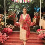 Gul Panag Instagram – The phulkari is such an integral part of our culture. From all things auspicious to all things festive -the phulkari is always there. Either as the main act. Or the supporting one, where we simply carry it on our forearms ( in addition to the full outfit and its own dupatta). At every wedding, shagan, engagement and jaago- the phulkari will ALWAYS make an appearance.

Here I’m wearing a bagh ( all over embroidery) from @1469original . Occasion is Vatana. 

And my outfit is borrowed from @simranpotnis – we’ve decided to have all our clothes in JV now. 😅

Blue sari is @ritukumarhq . From 1999. Qualifies as vintage I suppose 

Also, managed to get HIM to pose for a picture.😅

@keeratkular thanks for the photos. And for reminding me that the knot clutch exists in my wardrobe. And of course for EVERYTHING else.😂

P.S
Phulkari (ਫੁਲਕਾਰੀ) refers to the folk embroidery of the Punjab. Although Phulkari means floral work, the designs include not only flowers but also cover motifs and geometrical shapes.  Incidentally, culturally prevalent in Punjab, Pakistan too.