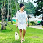 Gul Panag Instagram - Pool and beach vibes only.🤩 This trip, I rested the beginning to become fragile black and white @marksandspencer swimsuit. But I want want to take this opportunity to introduce you to two new ones- ( since I had so many queries on my stories). I believe a swimsuit should be comfortable, practical, durable and very flattering. 😅 So here’s a bit about these. Photo 1 is another trusted @marksandspencerindia suit. Durable. I have had it for about 5 years now. The neck strap is beginning to lose a bit of elasticity, but is adjustable so easy fix. Photo 2 is the new @ripcurl full sleeves suit I got recently. I end up spending a lot of time in the pool with Nihal. And often my shoulders and arms get badly burnt no matter how much sunscreen I apply. And this seems like a really good alternative. Not sure how durable it will be. It’s made a very fine, thin material almost like a pair of stockings. Photo 3 features a pink one , Roxy, that is also fairly new. (Got it last year here in Phuket. At the airport. There’s a great store that sells Quicksilver, Roxy and billabong in the arrival hall by the baggage belts.) It has Excellent stretch. And is very comfortable. The wrap is a really comfortable @Zara shirt I got some years ago. Photo 4 has the same swimsuit from photo 1 , but with a very nice wrap I picked up here, at the hotel on this trip. Nice flattering wraps are hard to come by / and this one is a particularly good one. For those of you who read through all of this, let me know if there are more queries you have, and I will answer them in the comments. Thanks for reading .❤️ Phuket, Thailand