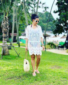 Gul Panag Instagram - Pool and beach vibes only.🤩

This trip, I rested the beginning to become fragile black and white @marksandspencer swimsuit. But I want want to take this opportunity to introduce you to two new ones- ( since I had so many queries on my stories).

I believe a swimsuit should be comfortable, practical, durable and very flattering. 😅
So here’s a bit about these.

Photo 1 is another trusted @marksandspencerindia suit. Durable. I have had it for about 5 years now. The neck strap is beginning to lose a bit of elasticity, but is adjustable so easy fix.

Photo 2 is the new @ripcurl  full sleeves suit I got  recently. I end up spending a lot of time in the pool with Nihal. And often my shoulders and arms get badly burnt no matter how much sunscreen I apply. And this seems like a really good alternative. Not sure how durable it will be. It’s made a very fine, thin material almost like a pair of stockings.

Photo 3  features a pink one , Roxy, that is  also fairly new. (Got it last year here in Phuket. At the airport. There’s a great store that sells Quicksilver, Roxy and billabong in the arrival hall by the baggage belts.) 
It has Excellent stretch. And  is very comfortable. The wrap is a really comfortable @Zara shirt I got some years ago.

Photo 4 has the same swimsuit from photo 1 ,  but with a very nice wrap I picked up here, at the hotel on this trip. Nice flattering wraps are  hard to come by / and this one is a particularly good one.

For those of you who read through all of this, let me know if there are  more queries you have, and I will answer  them in the comments. Thanks for reading .❤️