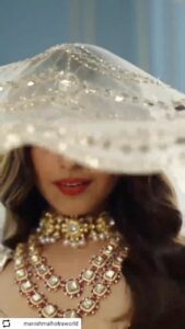 Heena Achhra Instagram - #Repost @manishmalhotraworld with @let.repost 
• • • • • •
Veiled in her golden moments unearthing the unparalleled radiance of rubies, the timeless  Polkis, and plush diamonds, make a heritage collectible for the #ManishMalhotraBride to possess. 

She adorns a Crème brûlée dupion crepe lehenga embroidered in delicate scallops with mukaish, metallic sequins, and antique metallic zardozi threads.

#Khaab Bridal Couture 2022 

@manishmalhotra05 

Jewellery: Manish Malhotra Jewellery by Raniwala 1881
@manishmalhotrajewellery 

Videographer: @neeraj_hinduja
Sound: @tech_panda  @kenzaniofficial

#ManishMalhotra 
#ManishMalhotraWorld #manishmalhotrajewellerybyraniwala1881 #ManishMalhotraVows #ManishMalhotraLabel #ManishMalhotraProductions #ManishMalhotraJewellery #ManishMalhotraVows #bride #bridal #bridaldress #bridesofindia #brides #indianbride