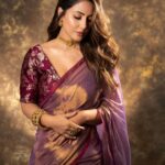 Hina Khan Instagram - Drenched in tradition 💜 Timeless beauty in every drape of saree.. . Saree @houseofurrmi Jewellery @karishma.joolry @motifsbysurabhididwania Styled by @kansalsunakshi MUAH @sachinmakeupartist1 @siddhi_hairstylist 📸 @kakali_das_photography #foreversareegirl #sareelove