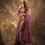 Hina Khan Instagram - Drenched in tradition 💜 Timeless beauty in every drape of saree.. . Saree @houseofurrmi Jewellery @karishma.joolry @motifsbysurabhididwania Styled by @kansalsunakshi MUAH @sachinmakeupartist1 @siddhi_hairstylist 📸 @kakali_das_photography #foreversareegirl #sareelove