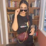 Hitha Chandrashekar Instagram - The perfect Graphic Tee for me doesn’t exis….. Received a Hamper from @namaskaraguruofficial & I styled it💁🏻‍♀️ thank you @rjmayuraa_raghavendra wishing you the best for your new venture! Ella olledaagli✨ Check out @namaskaraguruofficial for cool filmy tees and merchandise 😎