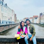 Hruta Durgule Instagram - When it seems as if you are turning pages in a story book 📖… and walked straight into a land of fairy tales 🧚‍♀️!! Strolling on a path in the middle ages… trying to believe it is all truly astonishing or astonishingly true🤩 #love #team #couple #travel #beauty #happiness #europe #color #dreamy #vacation #bruges #ghent #belgium #brussels Bruges and Ghent