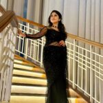 Kalyani Anil Instagram - Step into your dream…✨🖤 Saree @geesahh_designs Neckset @blushingtone_rentals 📸 @deepthi8934 Dubai, United Arab Emirates