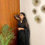 Kalyani Anil Instagram - Step into your dream…✨🖤 Saree @geesahh_designs Neckset @blushingtone_rentals 📸 @deepthi8934 Dubai, United Arab Emirates