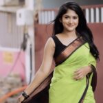 Kalyani Anil Instagram - Azhagiyee….🖤 Saree @ishvari.womens.world Blouse @geesahh_designs 📸 @talesbyaravind 💄 @brides_of_deepthi #reelkarofeelkaro #saree #reelitfeelit #trend #viral #tamil #tamilsong #love